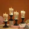 Elektroniskt ljusljusvatten fyllt Candle Light Decoration Small Night Light Christmus Music Box Decoration