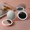 Kompaktowe lustra Mini LED Luminous Makeup Zwykle okrągłe Przenośne Składane małe kompaktowe lustro z światłem USB ręczna makijaż lusterka 231202