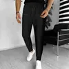 Pantaloni da uomo primavera casual coreani aderenti da jogging tinta unita Street