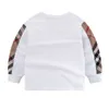 autumn/winter new round neck long sleeved plaid contrasting high-quality pure cotton comfortable T-shirt with a trendy base