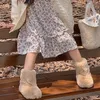 ブーツふわふわのぬいぐるみの女の女の子の贅沢な太い毛皮のブーツ幼児冬のファッション丸いつま先屋外の綿の靴231202