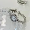 Relógios de pulso de luxo relógio de quartzo jóias mulheres prong configuração zircão cúbico cristal completo mãe-de-pérola senhora relógio presente da menina