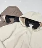 Trenchcoats voor dames Herfst Winter Middellange jas met capuchon Schapenvacht Revers Kleur Collision Taille Seal Jacket Parka
