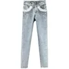 Jeans da donna Jeans skinny invernali Jeans bianchi da donna Nuova nicchia Socialite Tasche in pelliccia Strass Vestibilità ultra sottile Plus Pantaloni a matita caldi in velluto 231203