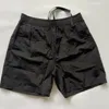 Nouveaux Shorts pour hommes classiques hommes en plein air décontracté lâche et séchage rapide en métal Nylon 5 points Shorts été hommes marque de mode court M-2XL