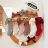 Premiers marcheurs 4 paireslot bébé filles chaussettes de noël enfants coton gros arc chaussette solide laine jambières fille enfant en bas âge doux épaissir 231202