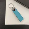 Alta calidad Unisex Triángulo LLAVE TITULAR Accesorios Diseñador Floral Lona Llavero Coche Llavero Anillo Encanto Pochette Accesorios Estampado Sello