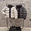 Piumino da uomo Parka 2023 Autunno / inverno Nuovo Mongjia Black Warrior Piumino per uomo e donna Giacca con cappuccio spessa e calda