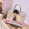 Designer Tote H 2024 Autumn Winter New Bates Doll Doll Funny Handbag مع نمط التماسيح شخصيًا