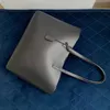 Nuevas bolsas de asas Mujeres Suave y ligero Bolso grande Cuero genuino Moda Bolsa para computadora portátil Universidad Lady Hombro Bolsa de compras Cartera negra Lujos Bolsos de diseñador