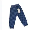 Nowe jesień i zimowe spodnie sportowe dla dzieci ciepłe, swobodne wersja wysokiej jakości spodni dla dzieci Rozmiar 90-150 cm F026