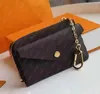 Designer carteiras titular do cartão de luxo mulheres bolsas em relevo flor carta mens mulheres titulares de cartão de crédito senhoras curto dinheiro bolsa de embreagem com caixa m69431 dicky0750