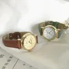 Orologi da polso Orologi impermeabili retrò Orologio al quarzo Quadrante semplice Bracciale casual Cintura in pelle Accessori da polso da donna Regalo delicato