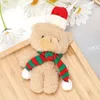 Gros Noël en peluche ours en peluche écharpe magasin de fleurs tenant bouquet boîte-cadeau avec main cadeau gâteau décoration couple dessin animé ours