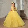 Flickklänningar blomma klänning gul fluffig tyll rund hals ärmlös båge rem bröllop söta lilla barn heliga nattvarden part