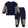 Pantalons pour enfants automne/hiver à carreaux couleur bloquant les pantalons de sport décontractés pour les garçons et les pantalons chauds et hygiéniques pour enfants