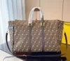 Projektant TOPOLATNY TORBY TRAVES Modne torebki Duże pojemność Utrzymywanie się na luggage torby na dufel luksusowe męskie torba bagażowa
