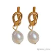 Urok 2023 Nowy francuski elegancki złoty kolor fasoli splicowane płaskie kolczyki perłowe do koreańskiej mody biżuterii impreza dla kobiet słodkie akcesoria R231204