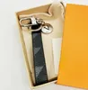 Neue hochwertige Modedesigner-Design-Schlüsselanhänger aus Titanstahl für Männer und Frauen, Auto-Schlüsselanhänger, Wohnaccessoires, Weihnachtsgeschenke, 13 Farben