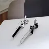 10x3cm黒と白のアクリルバタフライヘアクリップス女性用ファッションクラシックアイテムのためのワンワードクリップヘアピンジュエリーヘッドD2827