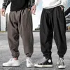Męskie spodnie Mężczyźni luzu harem jesienne chińskie lniane spodnie nadwagi wysokiej jakości swobodne spodnie marki męskie workowate joggery