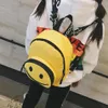 漫画ブリーフスマイルバックパックレッドブラック女性旅行リボン学生キャンバスダブルショルダーバッグmochila264d