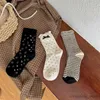 Chaussettes pour enfants, chaussettes à Tube central à pois et fleurs, Style blanc et noir