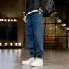 Mäns jeans stretchig midja Löst fit elastik med ankelbandad design Deep Crotch Colorfast Tickets Casual för män