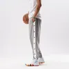 Pantaloni da uomo Pantaloni da jogging stile hip-hop con bottoni laterali elastici in vita