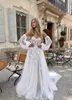 Abiti da sposa Boho A line Appliques Abiti da sposa firmati in tulle con maniche a sbuffo Abito da sposa con strascico