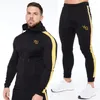 Tracksuits masculinos homens tracksuit corredores ginásio esportes fitness algodão retalhos impresso cardigan com zíper moletom moletom conjunto de duas peças