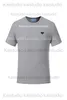 2023 Printemps / Été Design Tendance Marque Triangle Coton Col Rond Polyvalent Lâche Casual Lettre À Manches Courtes T-shirts Pour Hommes Et Femmes