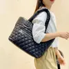 Evening Bags Lozenge pattern autumn and winter style Korean fashion padded jacket space cotton air bag versatile back down female bag 231204