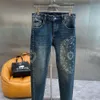 Jeans pour hommes Jeans pour hommes Pantalons décontractés de créateur d Jacquard Pantalon droit Mode Jeans lavés Hommes Femmes Pantalons de survêtement Pantalons brodés en métal ZIW3