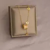 Hurtownia 40 damskich naszyjników biżuteria ze stali nierdzewnej 18-karatowe złoto stalowe stalowe fade oporne na złote naszyjniki