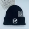 Şapka örme şapka moda rahat sıcaklık baotou şapka hayvan işlemeli yün şapka kulak koruma ters çevrilmiş akrilik soğuk şapka