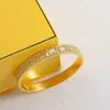 Pulsera de hebilla de oro Joyería de moda Para hombre para mujer Diseñadores Piedras preciosas Letra Pulseras de aleación Señoras Brazalete de cuerpo duro