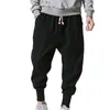 Pantalon pour hommes noir rouge hip hop streetwear mode jogger sarouel homme pantalon de survêtement décontracté mâle grande taille 4XL