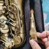 Saxophone Alto en laiton des états-unis, finition satinée brossée Antique, modèle instruments de musique professionnels à vent avec accessoires