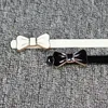 Cinture Cinturino in vita sottile in pelle PU Donna Cintura stretta femminile Bowknot Fibbia con fiocco in metallo sottile Nero Bianco Semplice