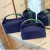 Luxe designer make -uptas handtas nieuwe lunchbox tas canvas vrije tijd washend mode een schouder draagbare high class dames cosmetische opbergzak