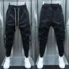 Spodnie damskie Capris czarny pasek jogger dres men na świeżym powietrzu swobodne chude spodnie haremowe streetwear wysokiej jakości projektantów spodni 231202