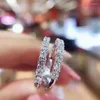Klusterringar Moissanite Eternity Ring 0 7 CT D Color VVS1 Clarity Platinum Plated 925 Sterling Silver Wedding Band Engagement231f