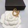 Designer de marca carta banda anéis mulheres 18k banhado a ouro prata oco latão material amor jóias de casamento anel de dedo fino escultura com selo de aço ajustável5