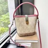 Avancerad design Kontrasterande färg liten hinkväska sommar multi fack handväska enkel axel crossbody kvinnors väska