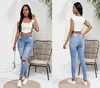 Kvinnor Casual Jeans Hiphop Slim Ripped Kne Holes Vintage Tassel Bleached Middle Midje Fit kvinnliga byxor Hög kvalitet