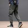 Mens Jeans Street Fashion Men Grey Big Pocket Spliced ​​Designer Casual Cargo Pants Hombre Hip Hop Joggers Loose Fit Harem Trousers 231204