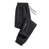 Herrbyxor män Autumn Winter Casual Sweatpants Elastic midja dragkropps blixtlåsfickor Sport tjock fleece foder joggerbyxor