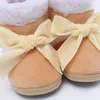 Bottes de neige chaudes pour bébé, en peluche, semelle souple épaisse, chaussures décoratives avec nœud papillon, chaussons de première marche pour bébés filles, antidérapantes