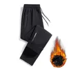 Pantalons pour hommes taille moyenne pantalons de survêtement hiver polaire doublé jogger avec poches zippées sport élastique pour la taille météo